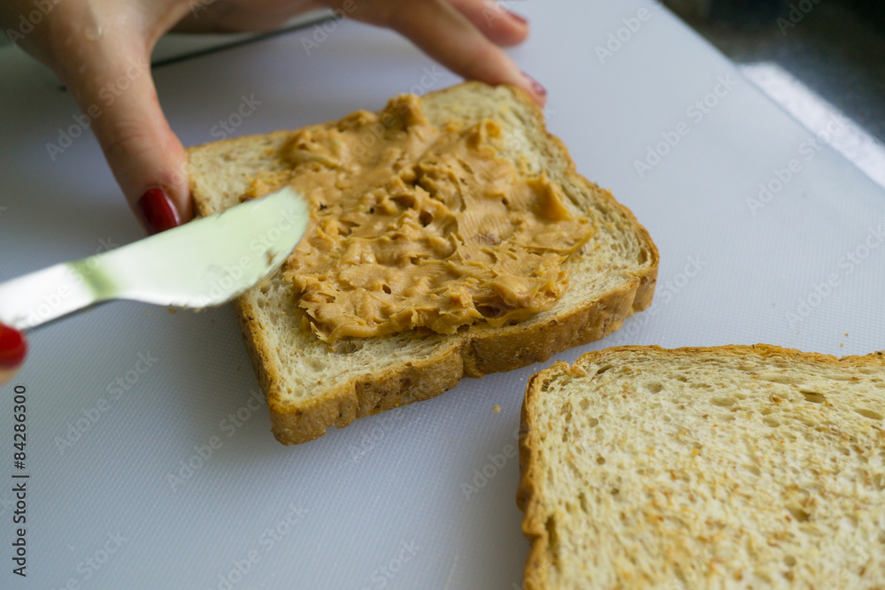 Making peanut butter sandwiches Making peanut butter sandwiches