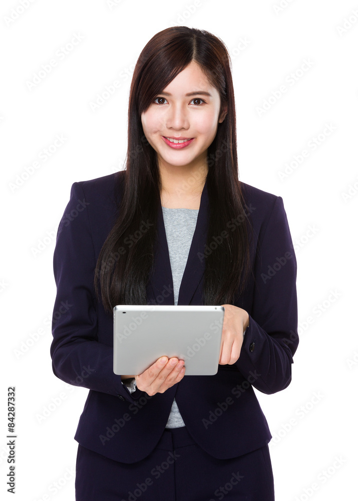 Young businesswoman use of tablet pc Young businesswoman use of tablet pc