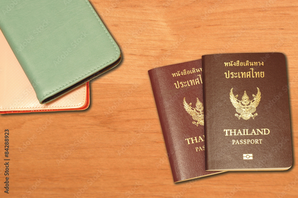 Two Thailand passports and leather passport covers Two Thailand passports and leather passport covers