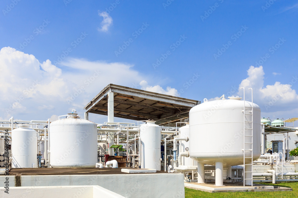 chemistry tank in factory with blue sky