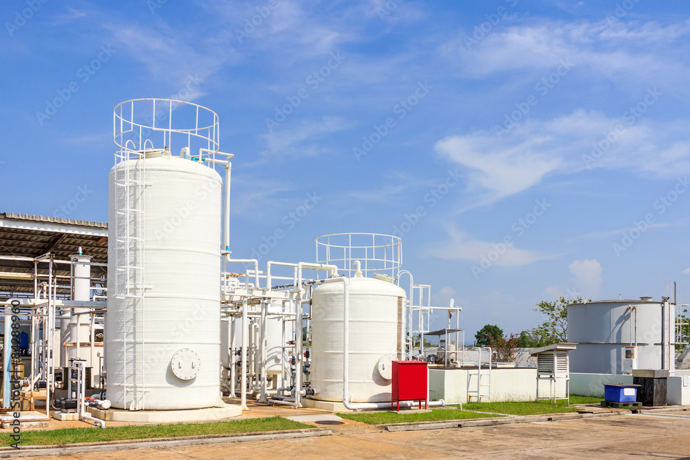 chemistry tank in factory with blue sky