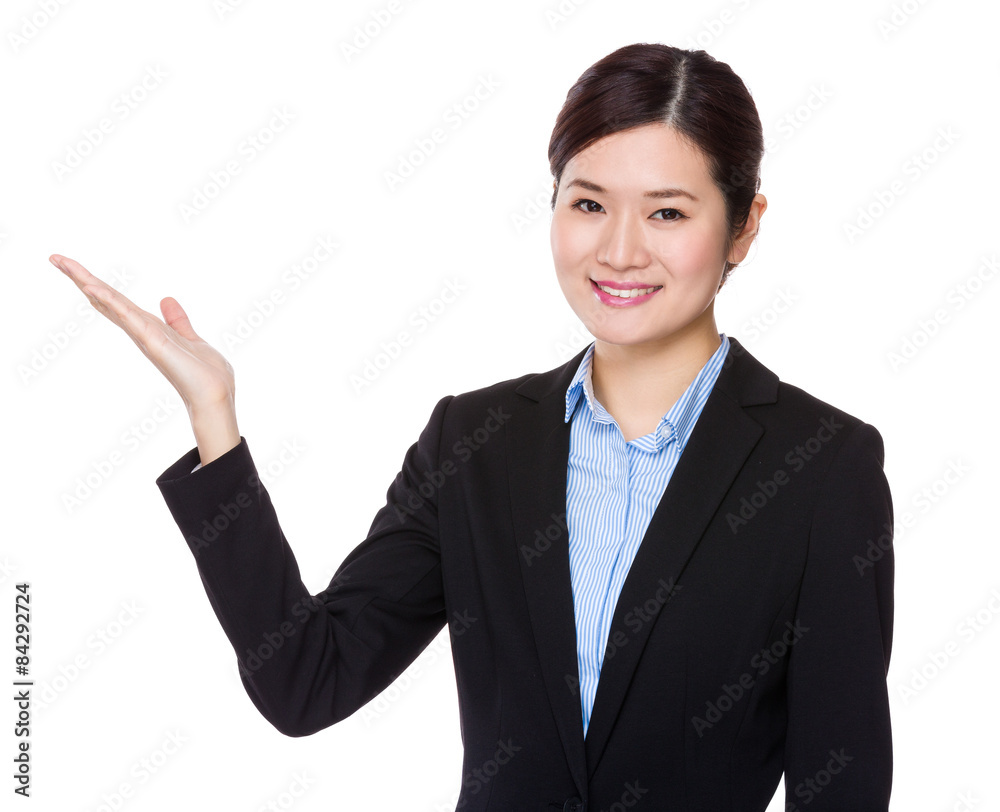Young businesswoman with hand presentation Young businesswoman with hand presentation