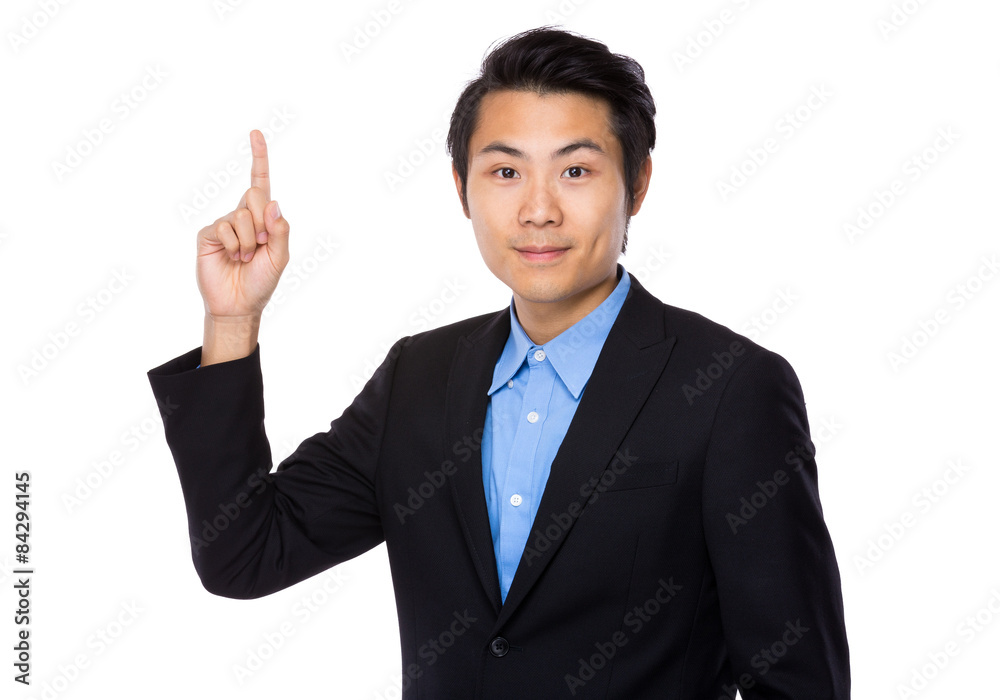 Businessman with finger pointing upwards Businessman with finger pointing upwards
