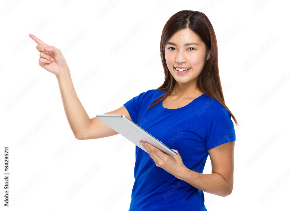 Young woman use of the digital tablet and finger pointing up Young woman use of the digital tablet and finger pointing up
