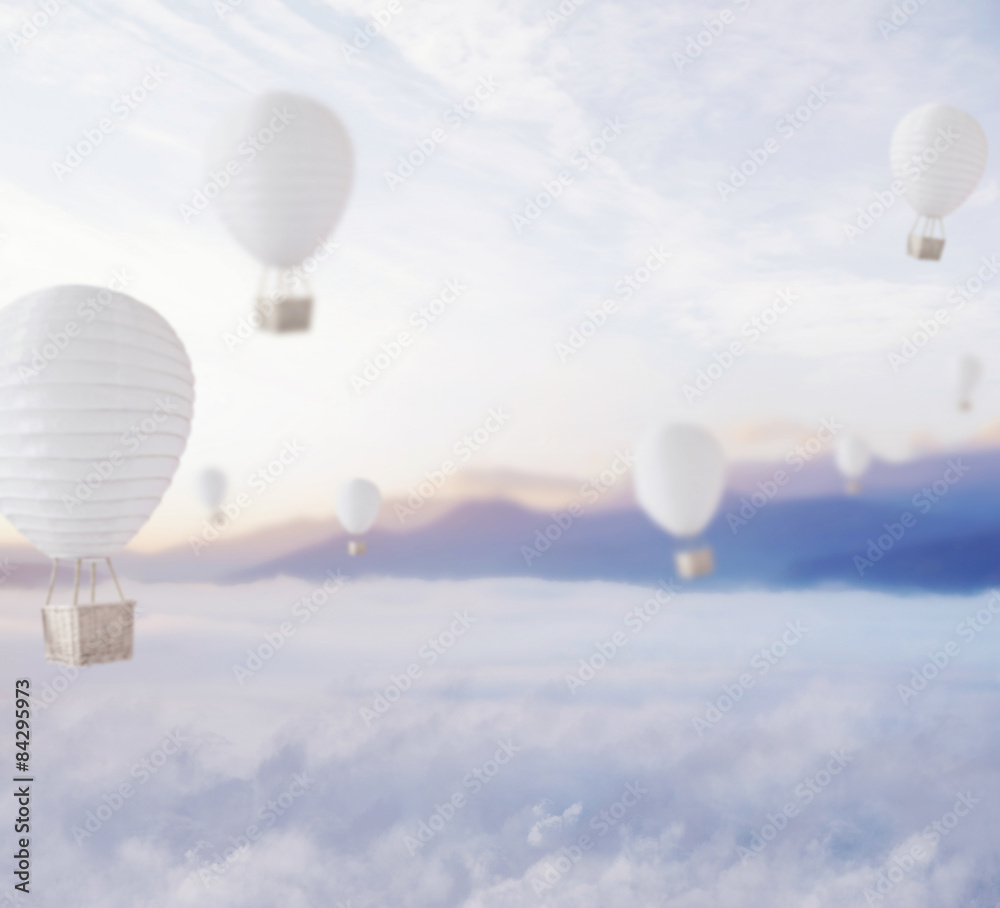 Naklejka premium Defocused balloons over dreamy sky