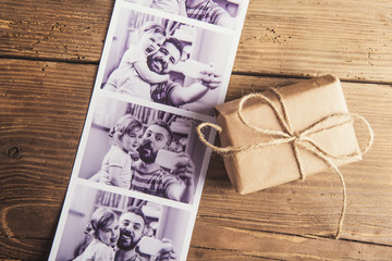 Fathers day composition. Studio shot on wooden background.