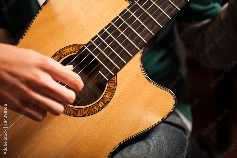 Fototapeta premium Man playing guitar