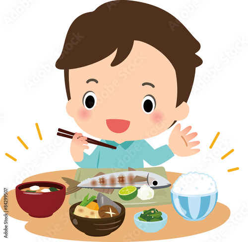 和食の晩御飯を食べる男性