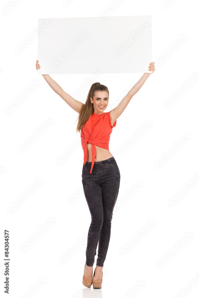 Smiling Girl Holds Up A Poster Smiling Girl Holds Up A Poster