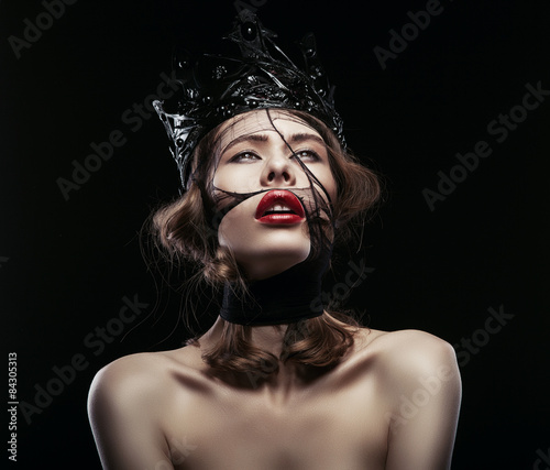 pretty woman in dark crown