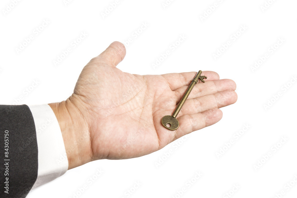 Old Key in Business man on White background Old Key in Business man on White background
