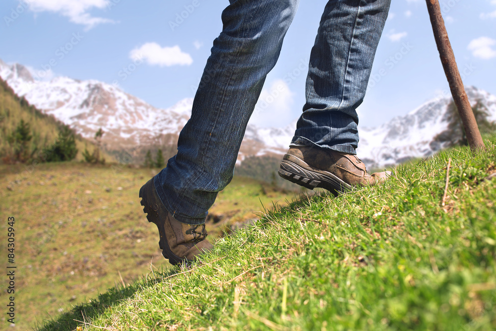 man walking to raise the top of the mountain man walking to raise the top of the mountain