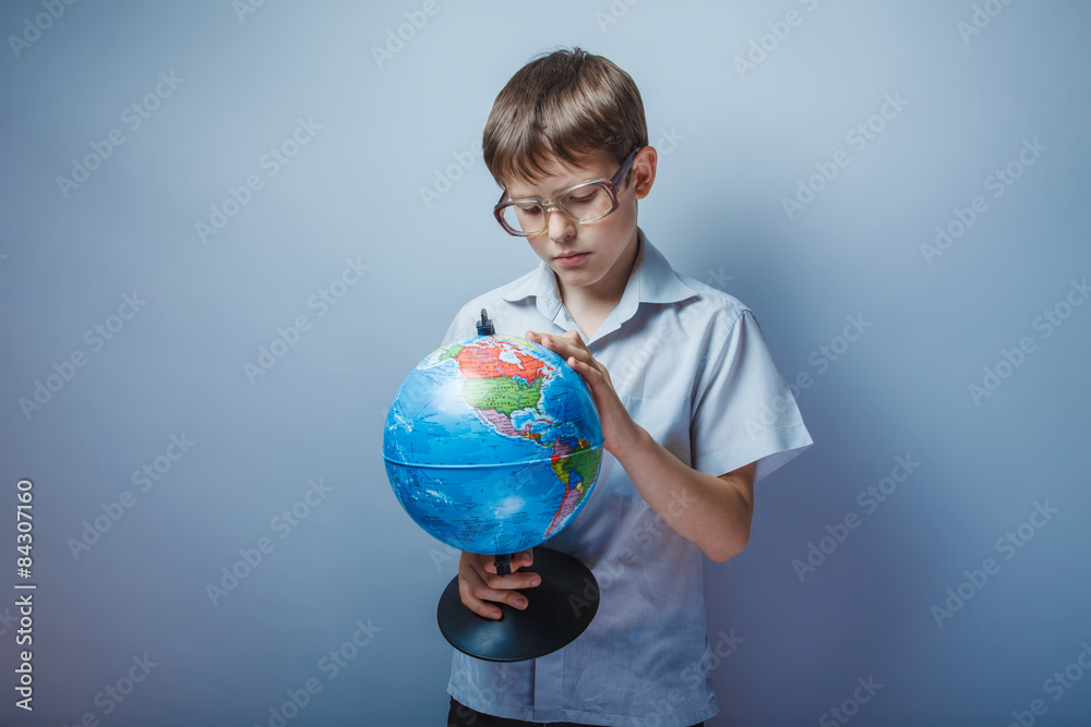 Teenage boy about ten years old European appearance in a light b Teenage boy about ten years old European appearance in a light b