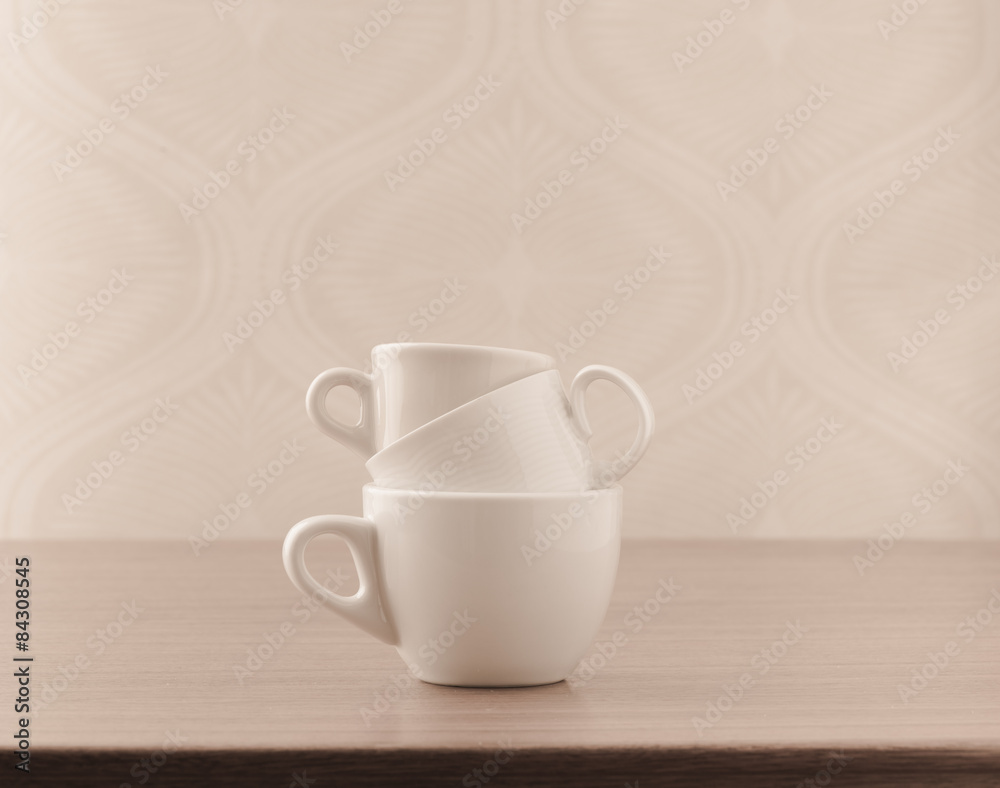 Empty coffee cups on wooden table Empty coffee cups on wooden table
