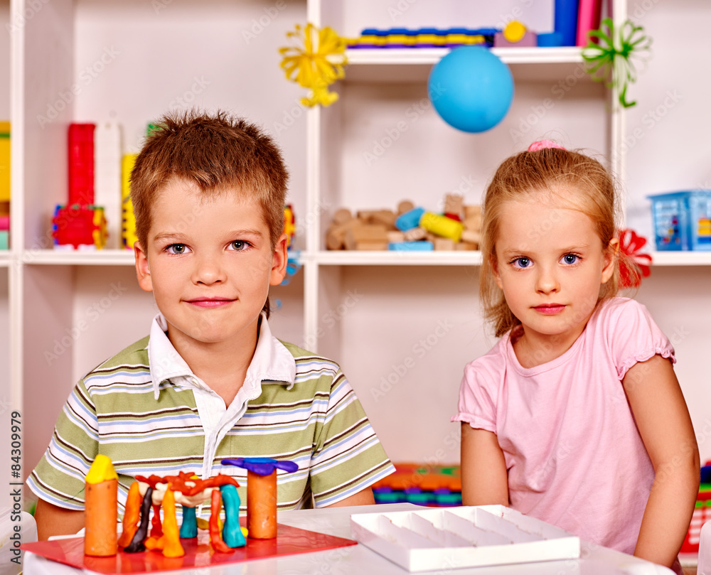 Fototapeta premium Child cutting out scissors paper.