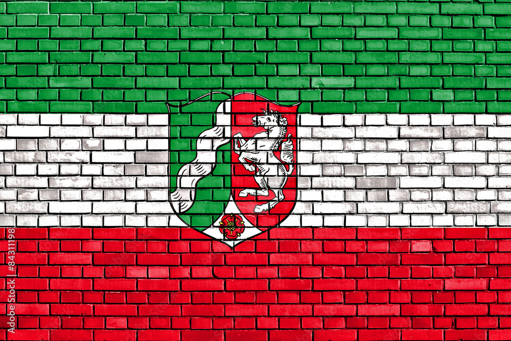 flag of North Rhine-Westphalia painted on brick wall