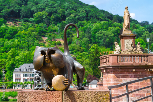 Photography Bronze sculpture of a monkey on the old bridge. Heidelberg. Germ
