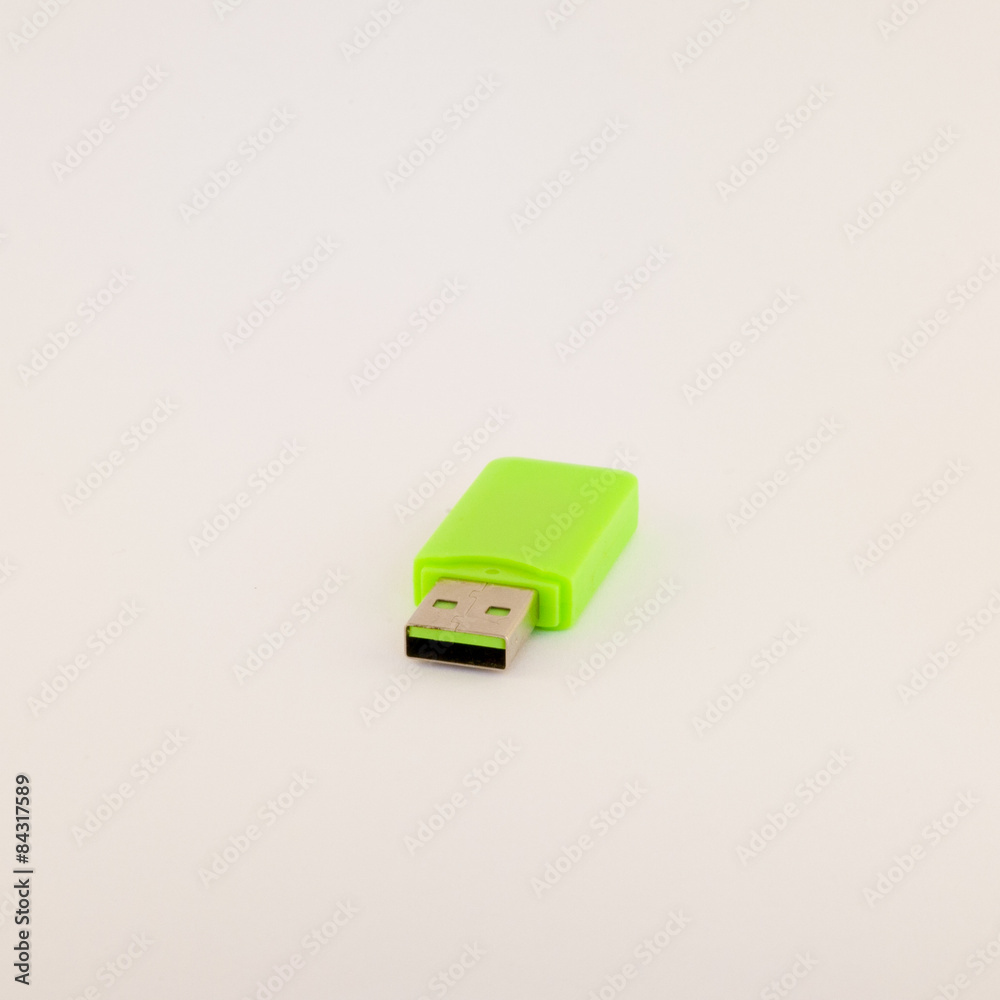 Green USB memory stick isolated on white Green USB memory stick isolated on white