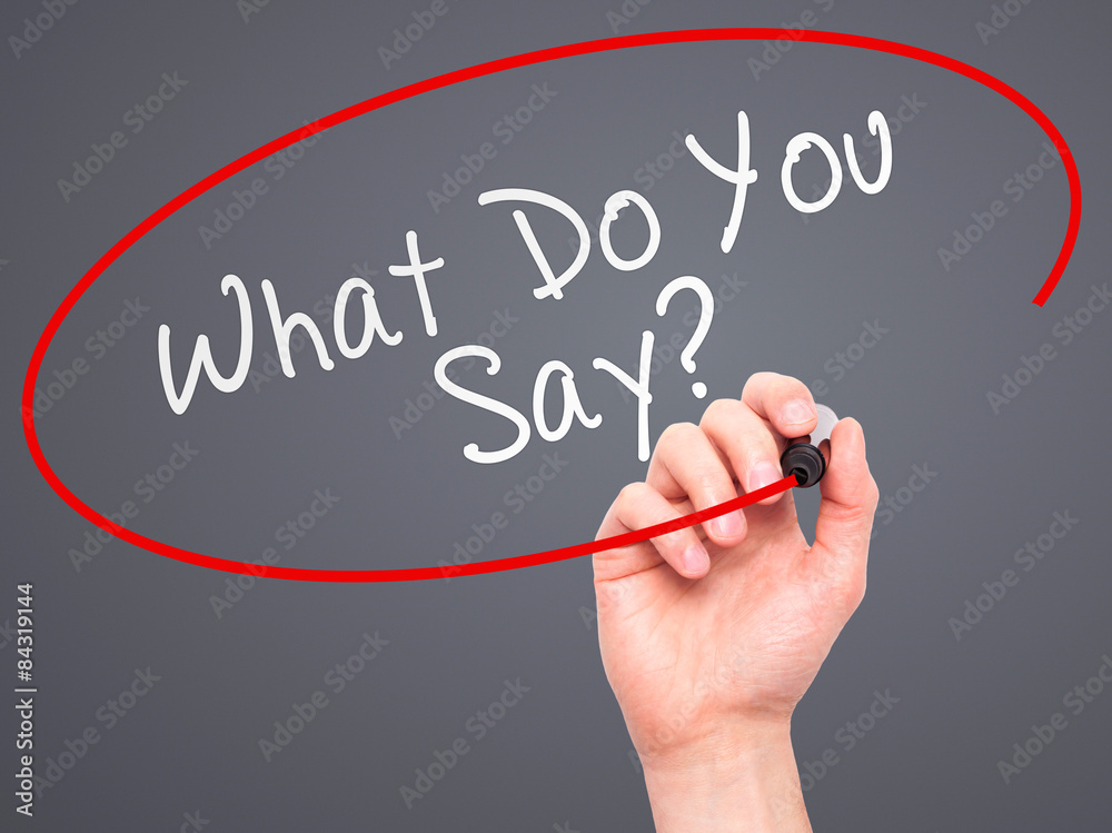 Man hand writing What Do You Say on visual screen Man hand writing What Do You Say on visual screen