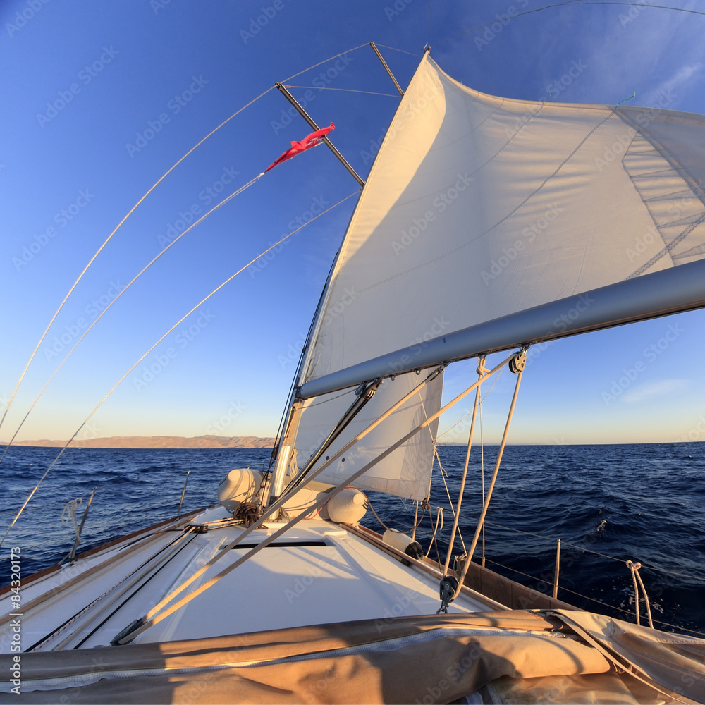 Fototapeta premium Sailboat crop during the regatta