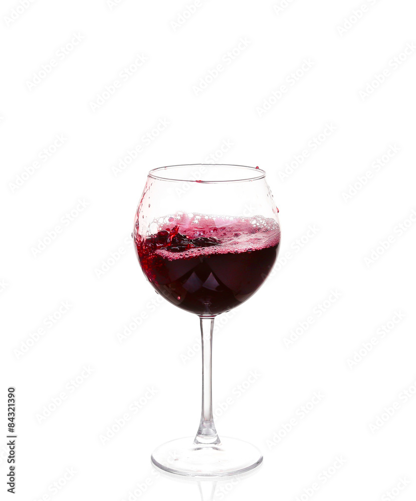 Red wine pouring on white background Red wine pouring on white background