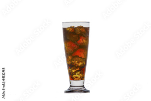 Cola glass with ice cubes on a white background 