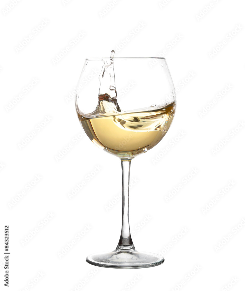 WHITE wine swirling in a goblet wine glass, isolated on a white WHITE wine swirling in a goblet wine glass, isolated on a white