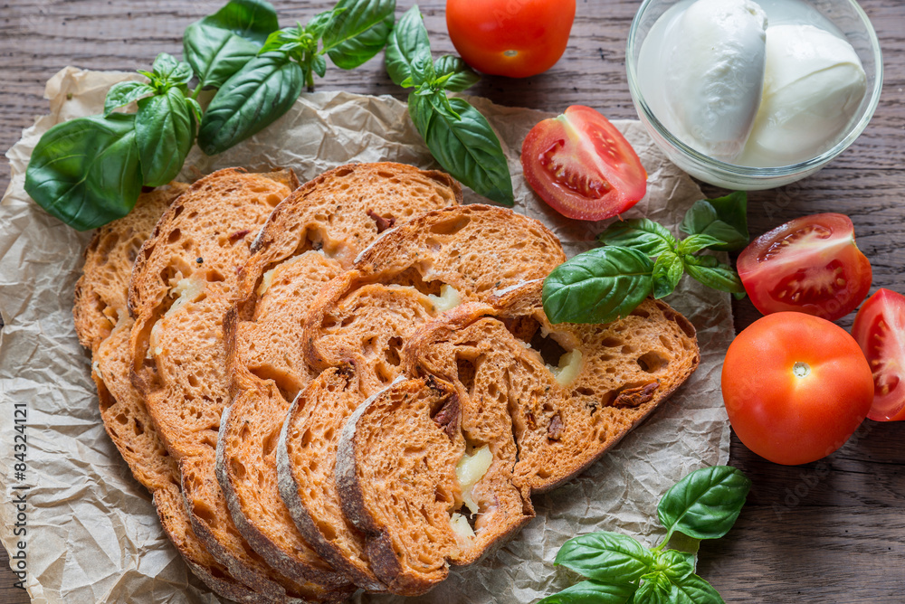Slices of tomato bread with mozzarella Slices of tomato bread with mozzarella