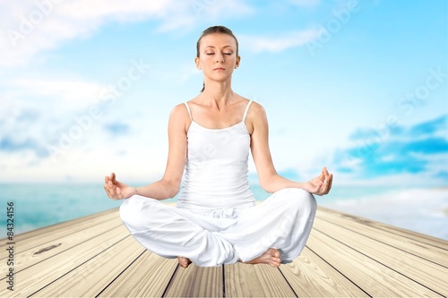 Yoga  Meditating  Women.