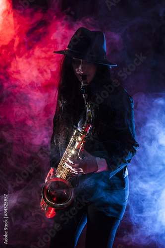 Young lady with her saxophone