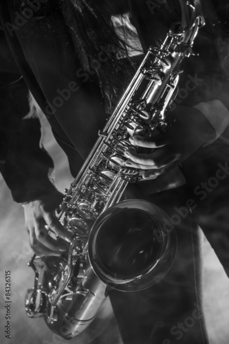 Photography Young lady with her saxophone