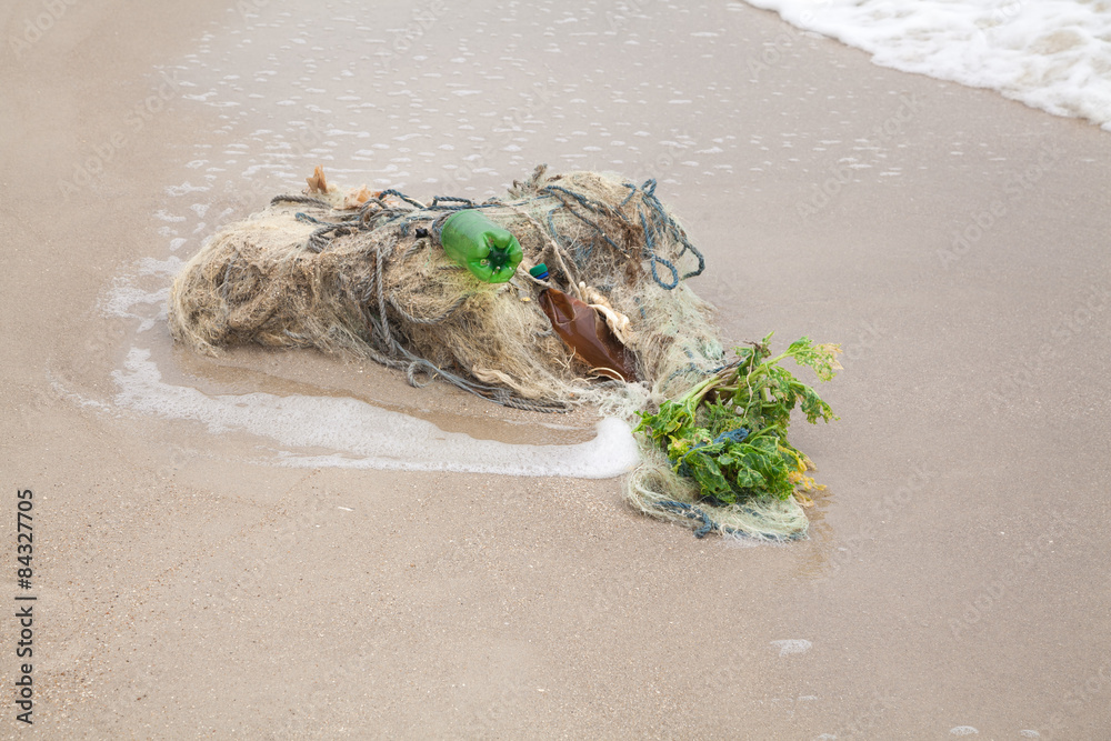 Tangled fishing nets on the beach Tangled fishing nets on the beach