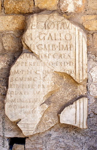 Latin illegible inscritption on ancient stone, Tarraco, Tarragon