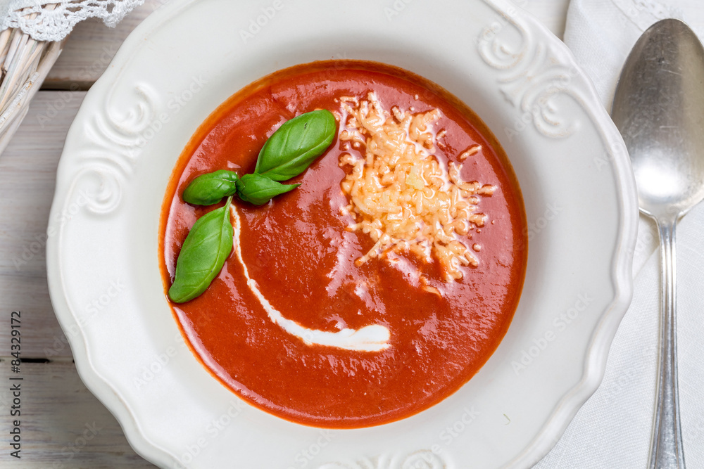 Tomato soup with cheese, basil and cream Tomato soup with cheese, basil and cream