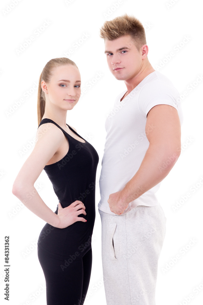 portrait of young sporty couple in sportswear isolated on white portrait of young sporty couple in sportswear isolated on white