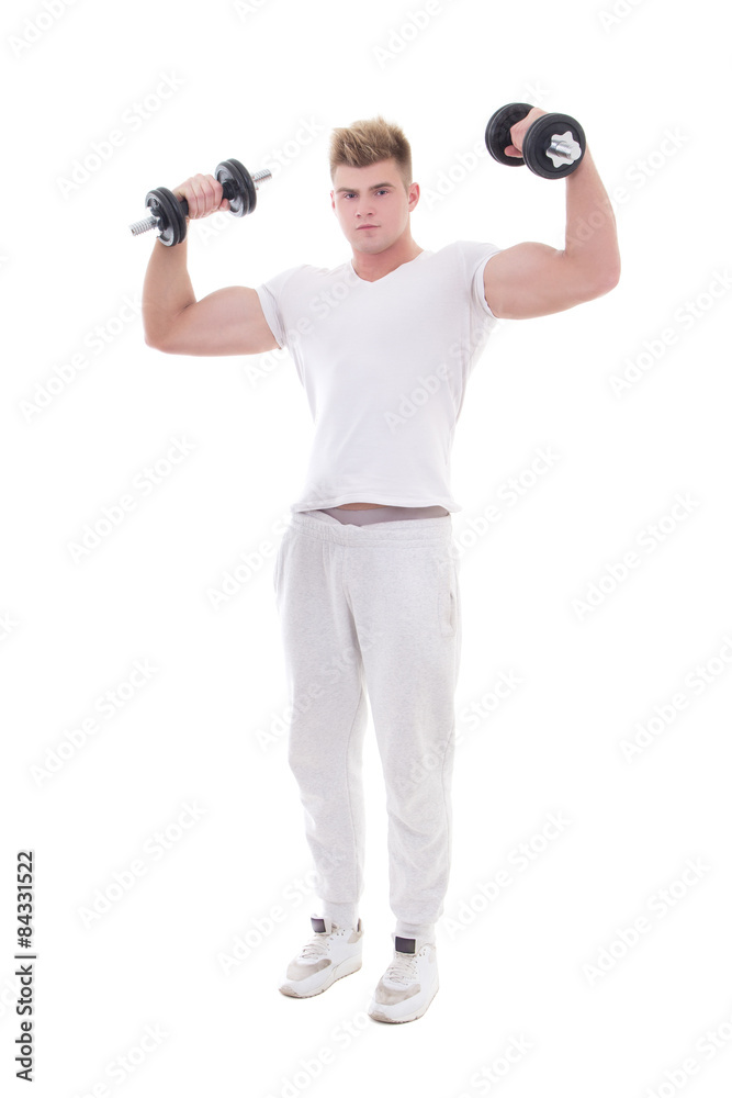 young handsome man in sportswear doing exercises with dumbbells young handsome man in sportswear doing exercises with dumbbells