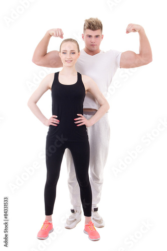 slim woman and muscular man in sportswear isolated on white