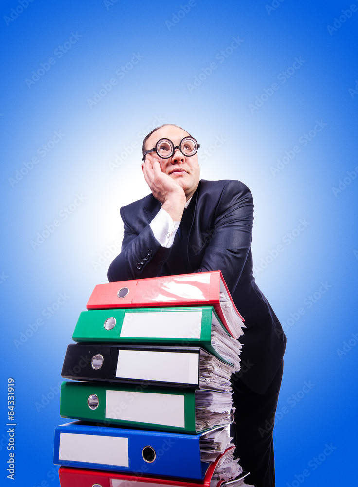 Funny man with lots of folders on white