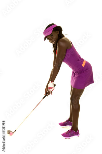 African American woman purple golf ready to swing smile