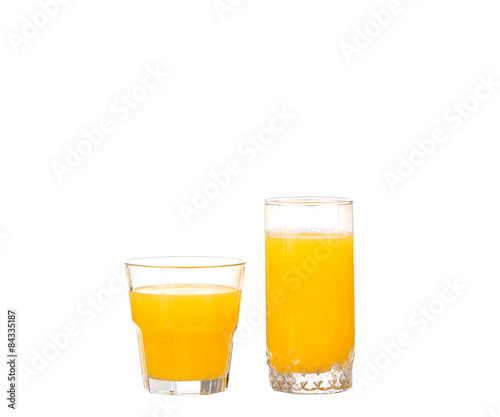 Orange juice and slices of orange isolated on white