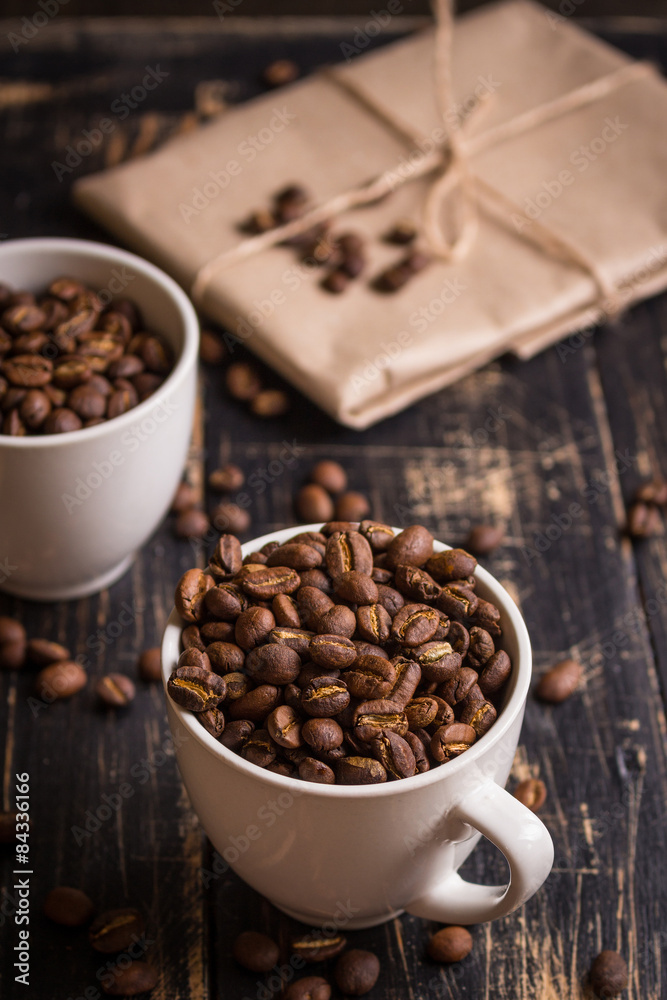 Fototapeta premium Coffee beans in a cups