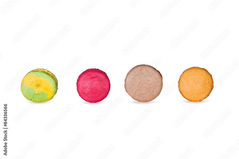 Close up colorful macaroons isolated on white background. Close up colorful macaroons isolated on white background.