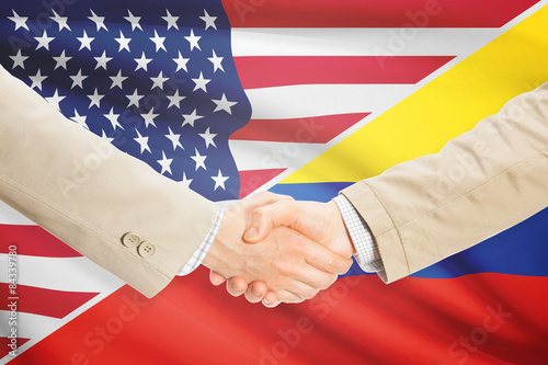 Businessmen handshake - United States and Colombia