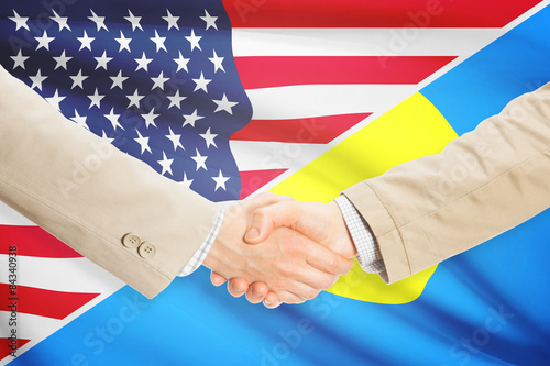 Businessmen handshake - United States and Palau