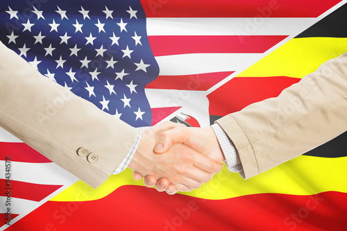 Businessmen handshake - United States and Uganda