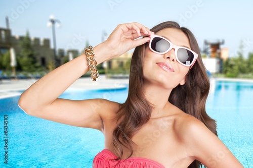 Swimsuit, glasses, charming. © BillionPhotos.com
