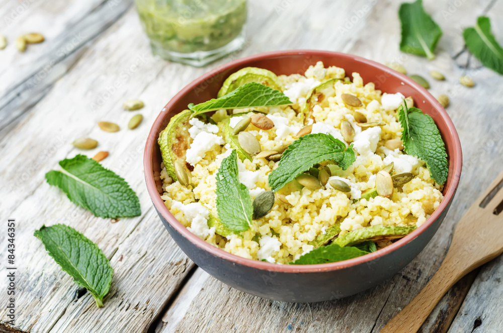 zucchini, millet, mint, pumpkin seeds, goat cheese salad with co