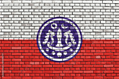 flag of Rakhine painted on brick wall photo