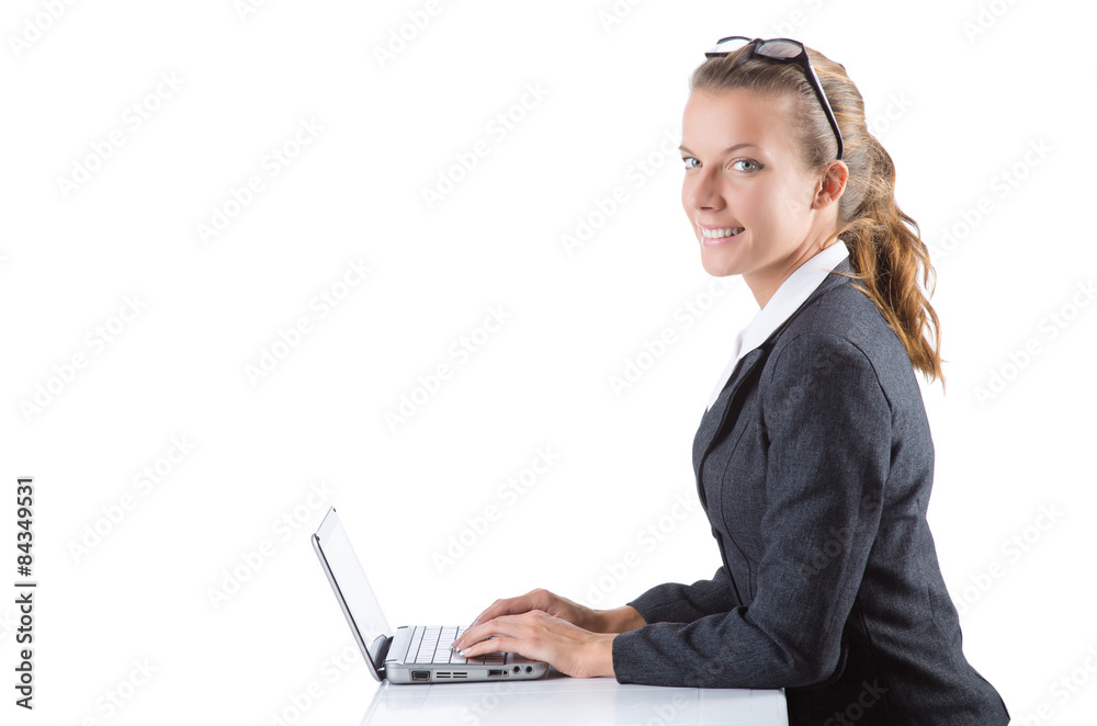 Office manager typing on the laptop isolated on white Office manager typing on the laptop isolated on white
