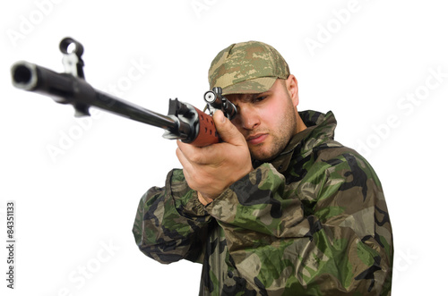 Solider holding gun isolated on white